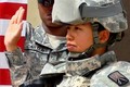 Female soldier taking the oath of reenlistment